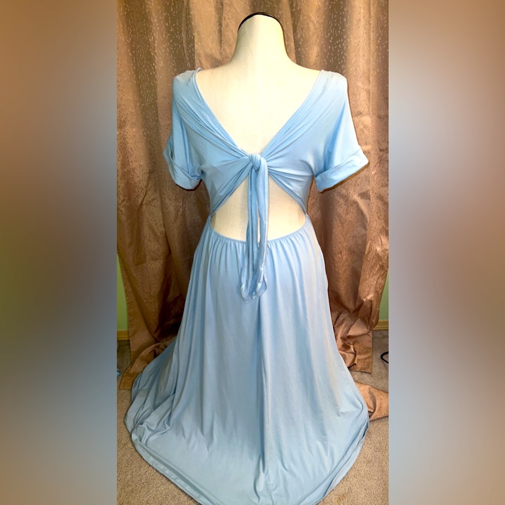 Flowy baby blue dress, open back with tie. Size large but fits medium-large.